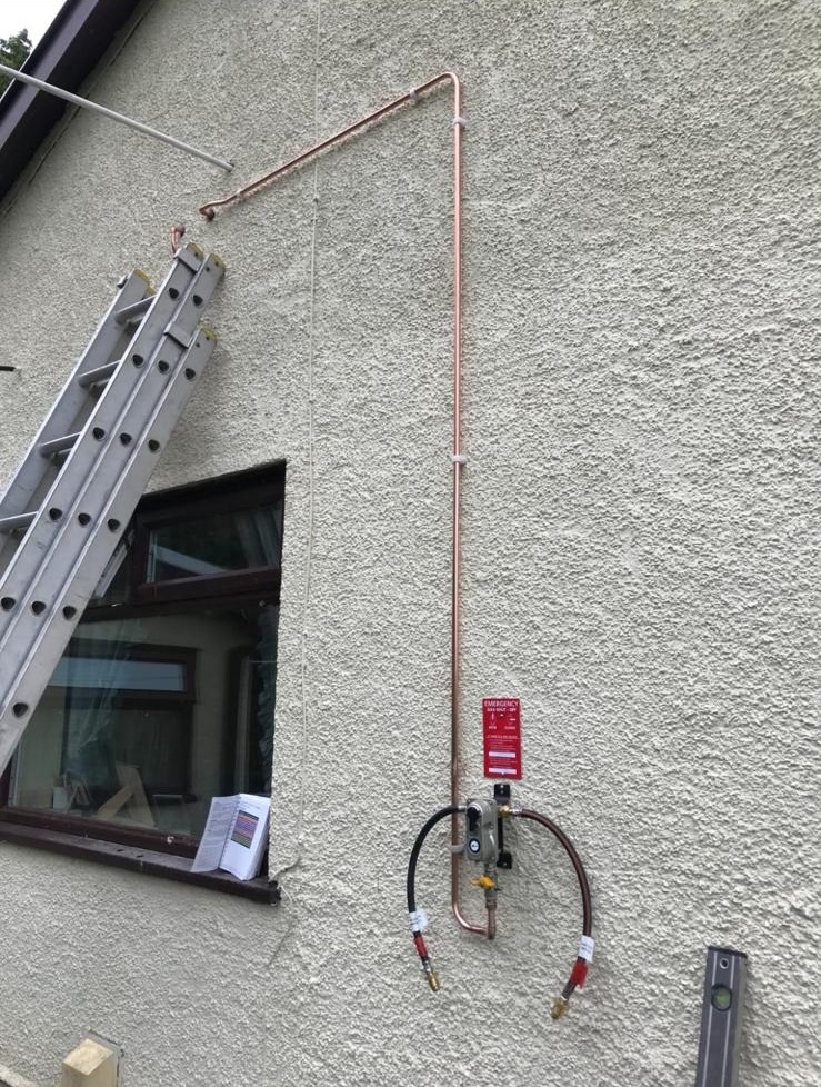 Exterior copper pipework with emergency shut-off